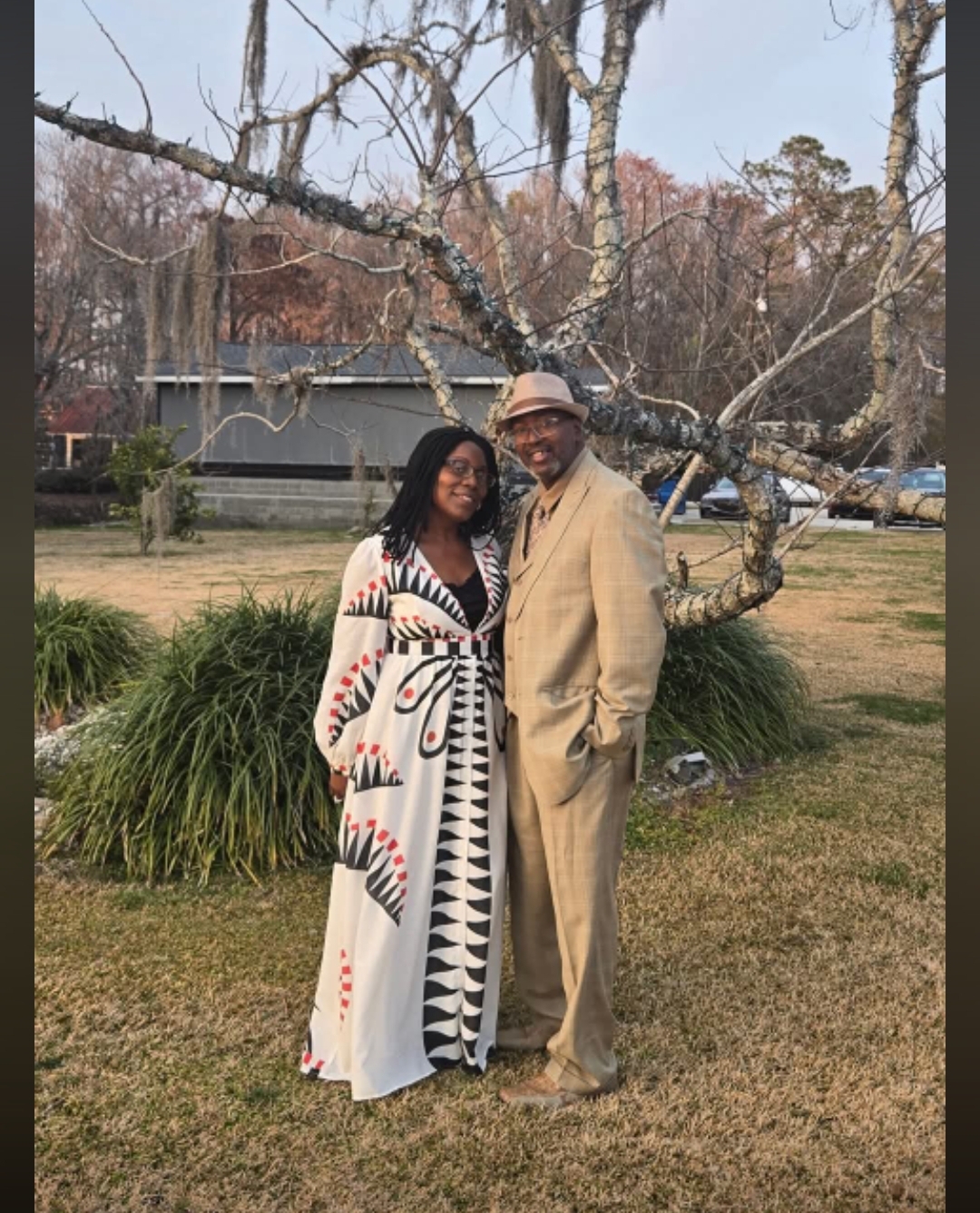 Sebrina Petterson standing outdoors with her husband